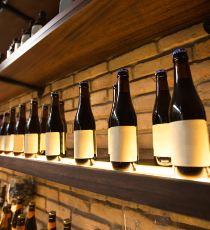 Closeup of shelves with bottles in pub